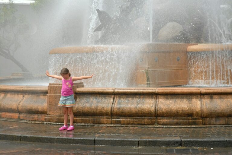 Little girl plays at Puerto Rico fountain